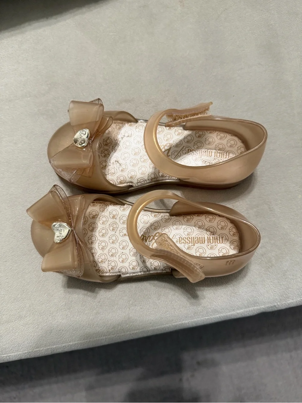 Mini Melissa Girls' Nude Glitter Bow Jelly Sandals with Heart Gem